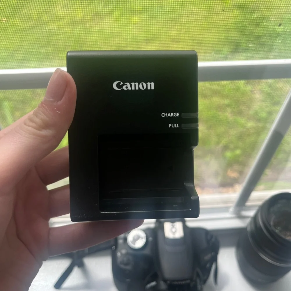 Canon T-5 Camera + Lense + Travel Bag. Had for a few years and never used!